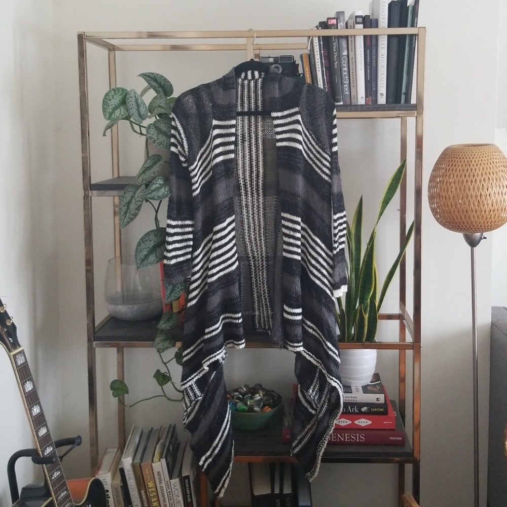 Black, grey, and white striped sweater